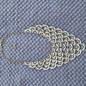 Elegant Gold and White Drape Necklace